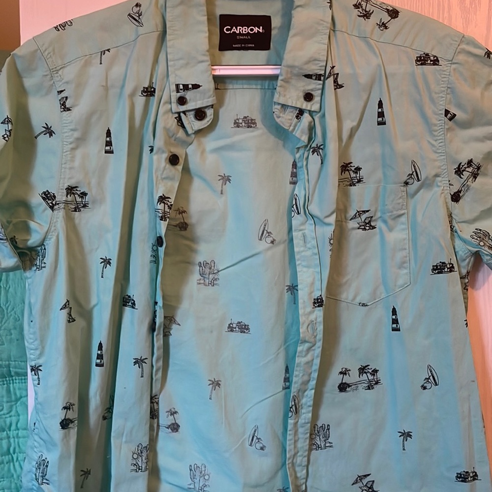 Shot sleeve button down shirt. Gently worn. Perfect for a casual date night.